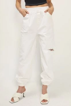 STORETS Britney Slash Cutout Joggers CLOTHING